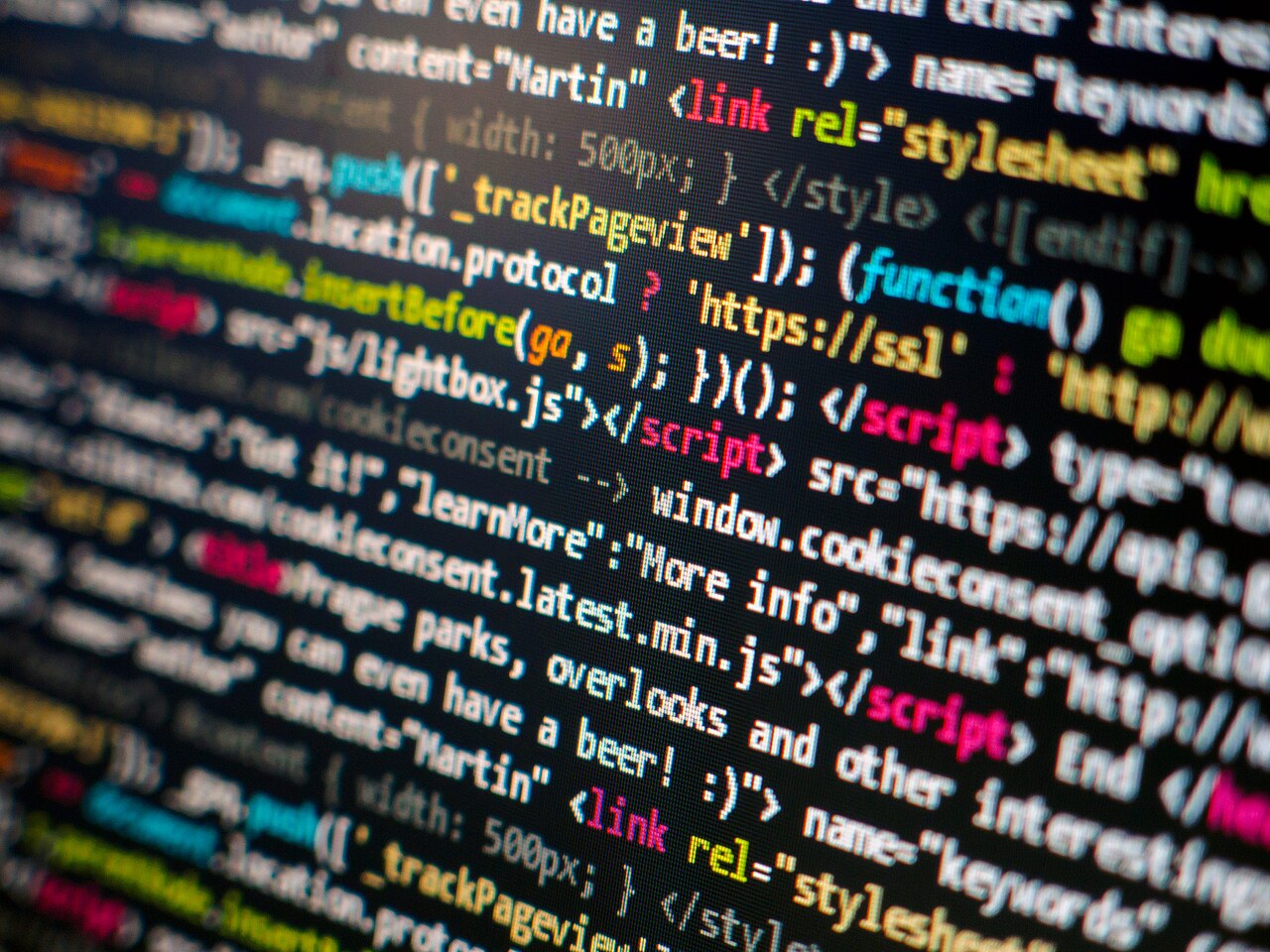 HTML and JavaScript code on a dark screen